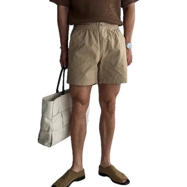Cotton loose fit sports shorts in black, white, or khaki colours for summer athletics
