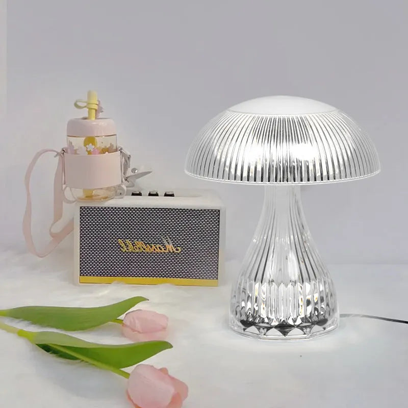 USB rechargeable bedside lamp with touch control and three-colour LED light on tabletop