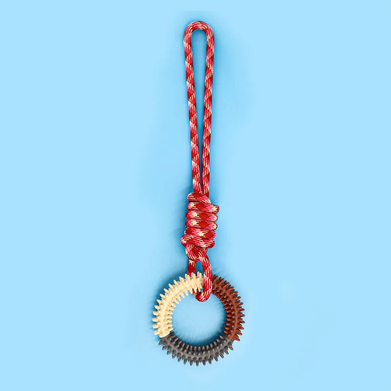 Colourful blue, red, and rose red braided rope dog chew and tug toy, 43 cm long.