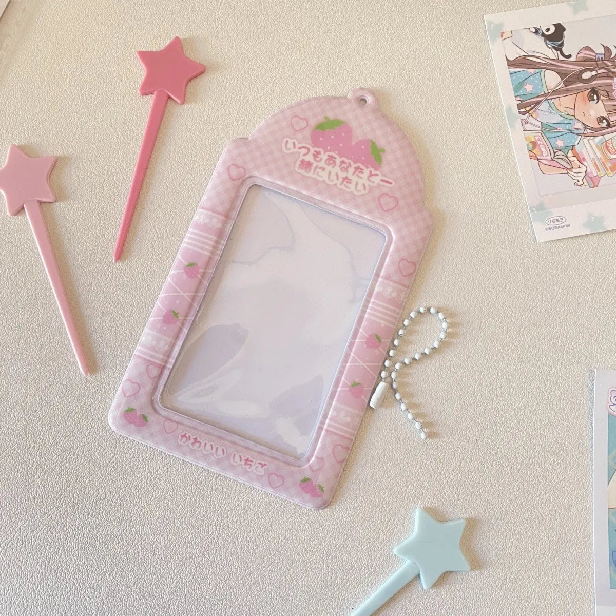 Cartoon strawberry design PVC meal card holder measuring 7.6cm by 13.6cm