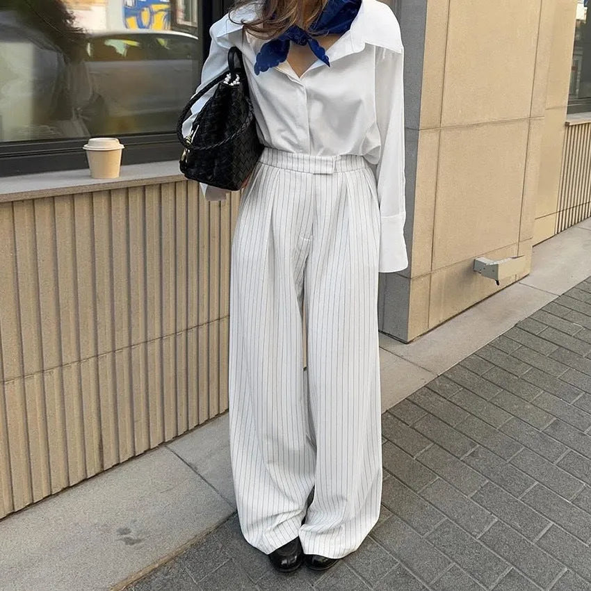 White striped loose fit wide-leg commuter trousers with zip fastening