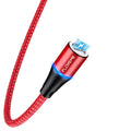 Black magnetic USB charging cable with illuminated side light on connector, next to smartphone.