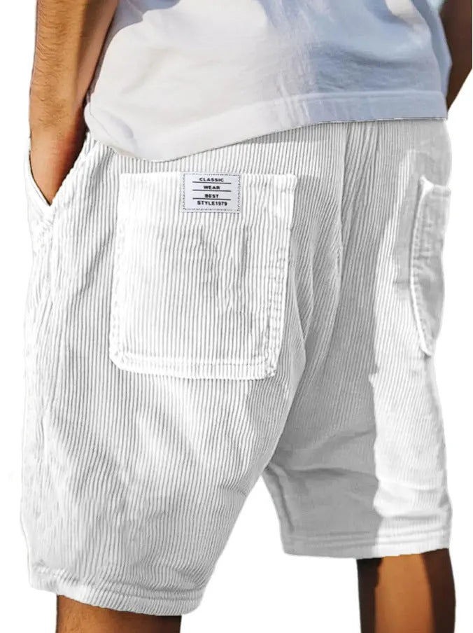 Men's grey corduroy shorts with multiple pockets and straight-leg cut on a neutral background.