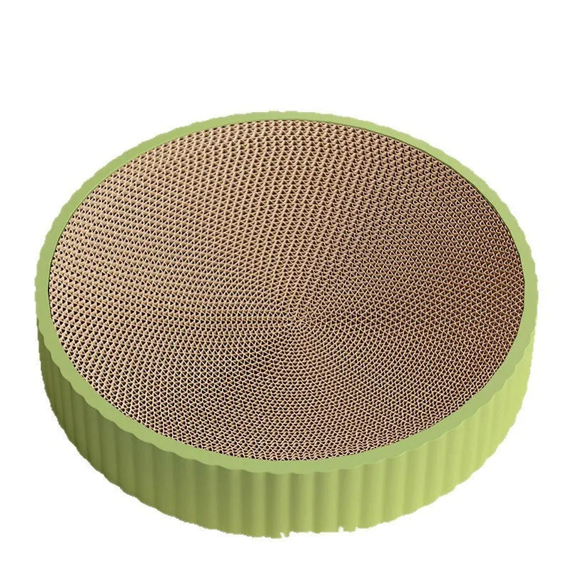 Green and white round cat scratching board with replaceable corrugated cardboard panels.