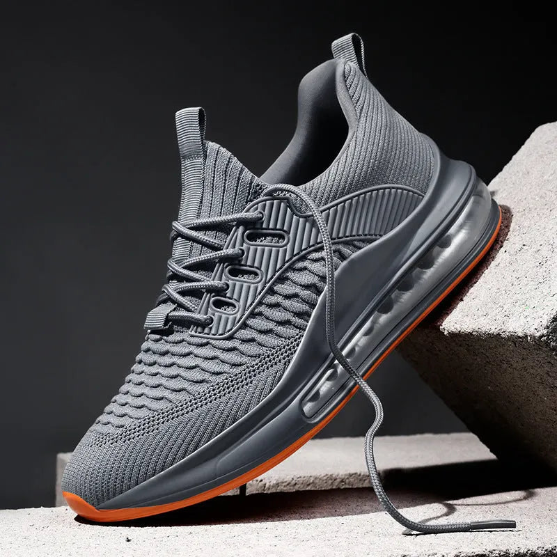 Men's black low-top mesh running shoes with white rubber sole and lace-up front.