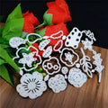 Silver carbon steel flower pattern paper cutting die measuring 14.3 by 9.9 centimetres