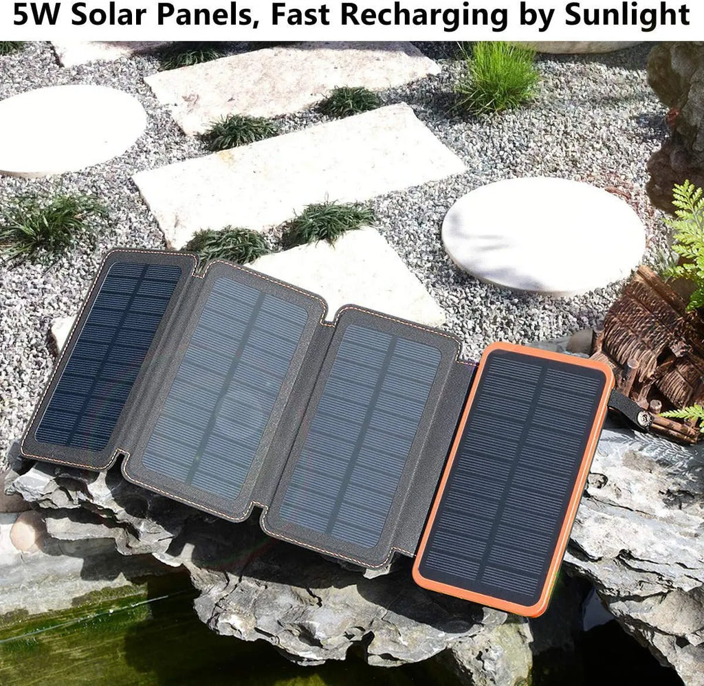 Black solar power bank with leather casing and monocrystalline solar panel showing charging ports and LED light