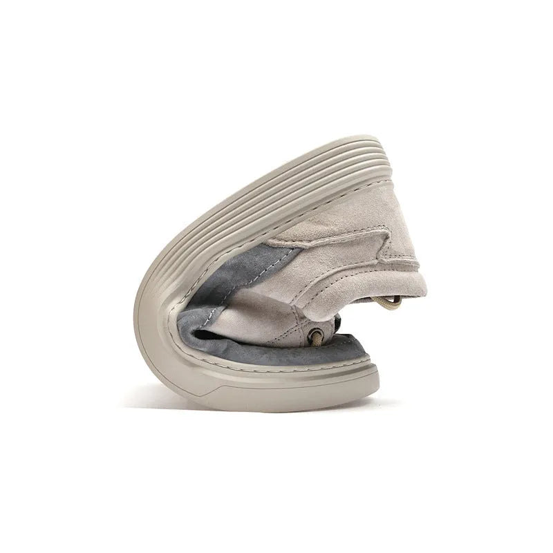 Men's grey casual skate shoes with pigskin upper and rubber sole showing lace-up front design