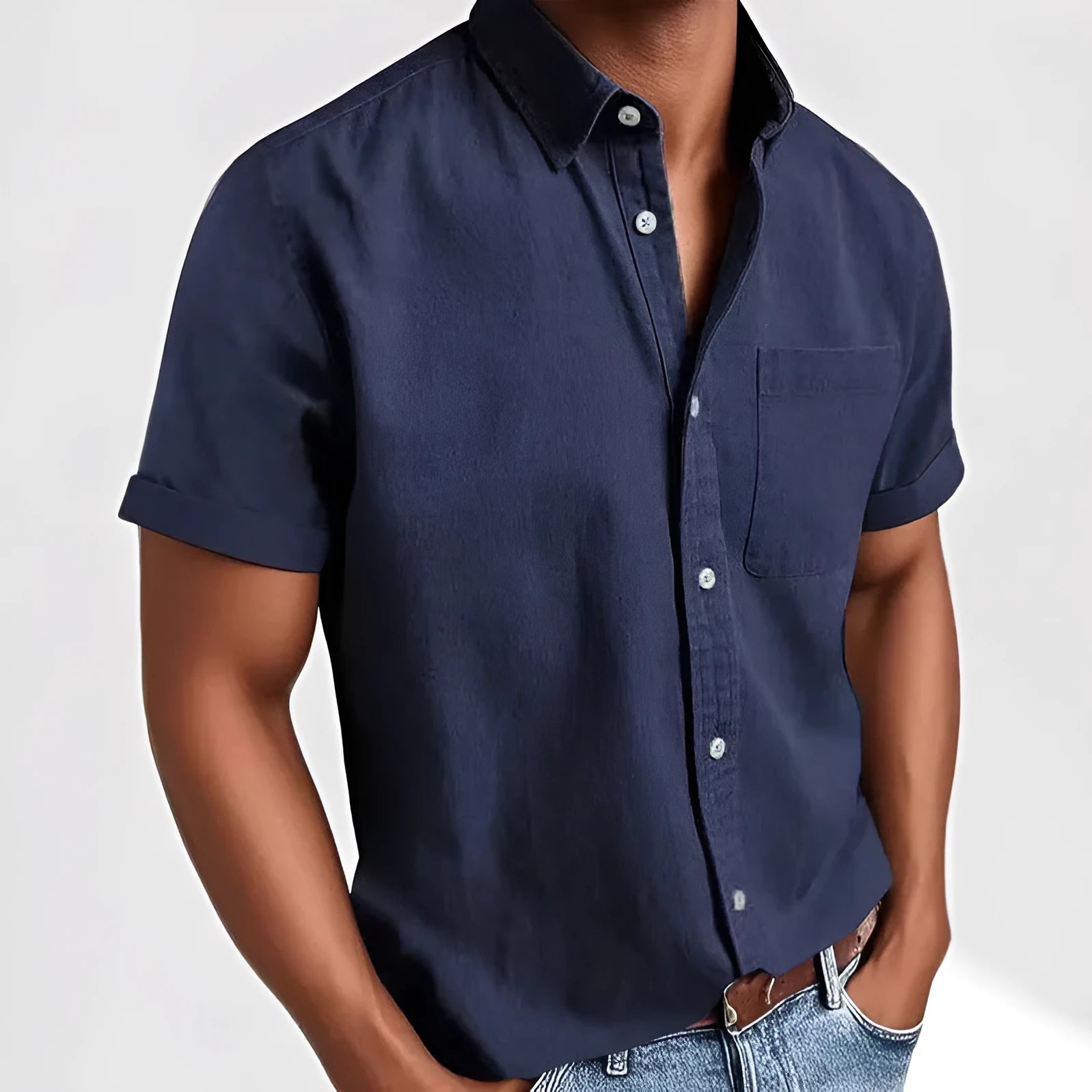 Men's loose fit short sleeve cardigan shirt in a cotton blend fabric on a hanger