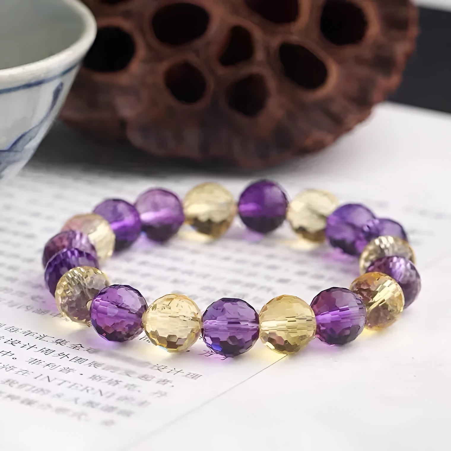 Handcrafted 128-facet cut crystal bracelet in amethyst, ametrine, or citrine colour with choice of bead size.