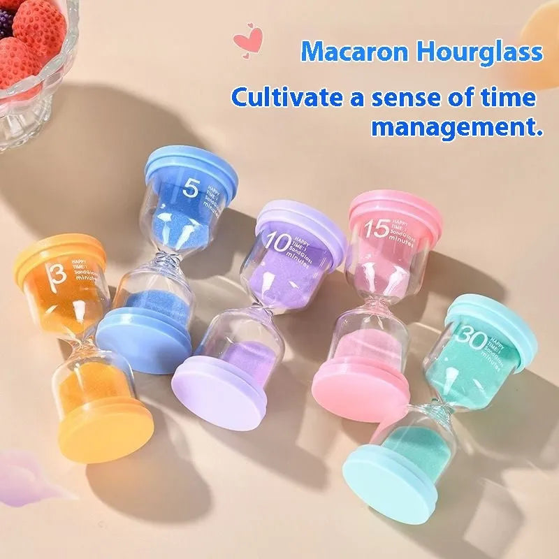 Handmade glass sand timer with blue sand, showing modern minimalist hourglass design.