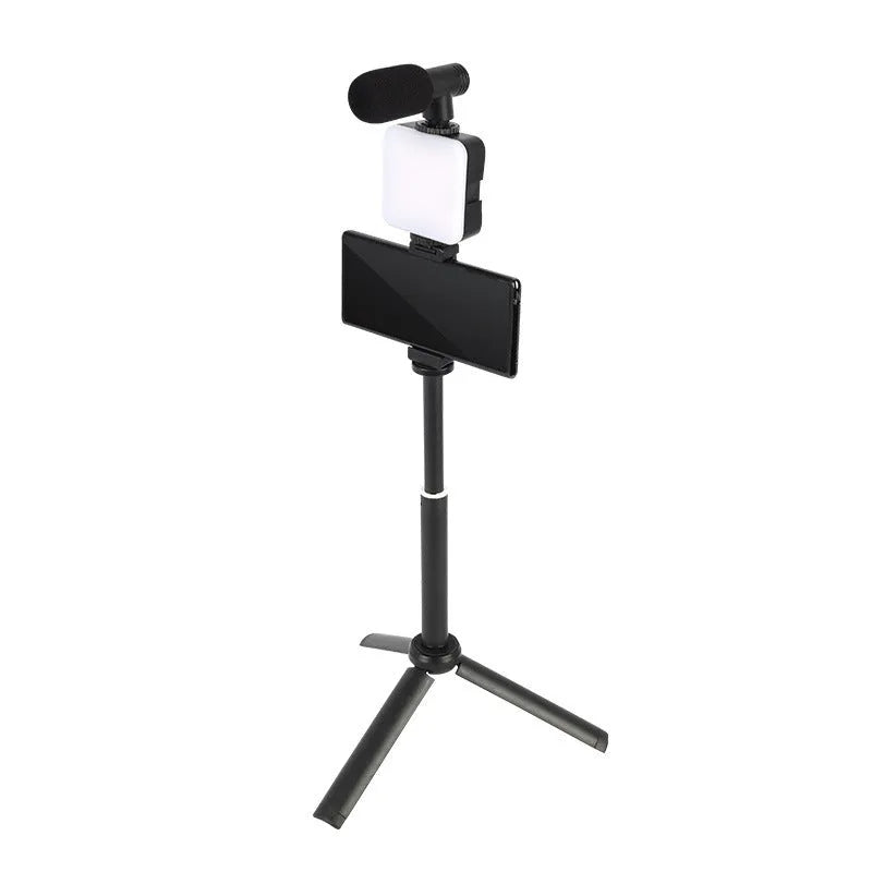 Mini square outdoor camera flash on a small tripod with a rotatable head