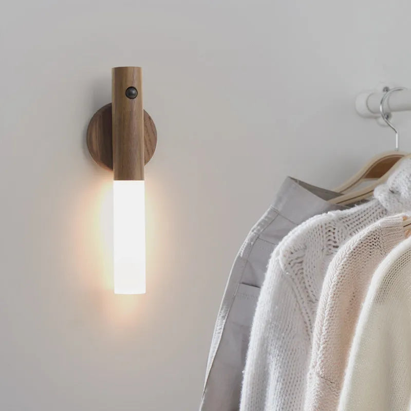 Smart sensor LED desk lamp in wood and acrylic glass on a desk.