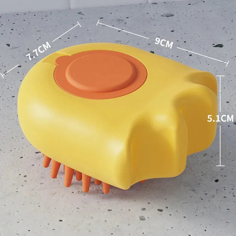 Blue pet bath brush with massage comb bristles and a built-in shampoo box.