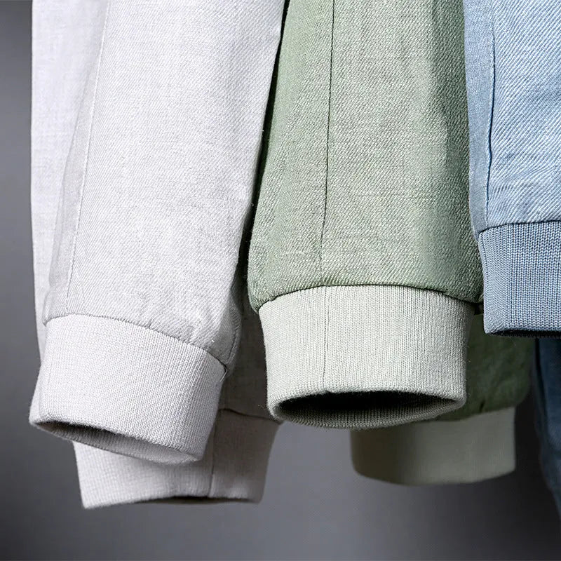 Men's thin cotton linen jacket in blue, grass green, or heather gray on a hanger.