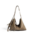 Full-grain leather women's crossbody bag in biscuit with spliced design and zip closure