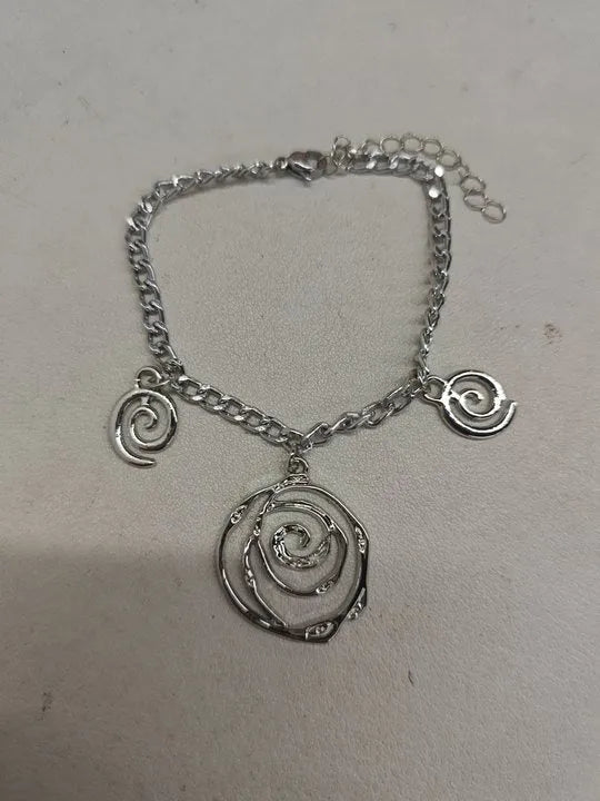 Geometric spiral donut jewellery set with necklace, bracelet, and earrings on adjustable 41-50cm chain