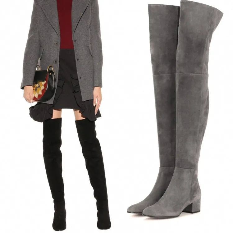 Grey suede women's flat over-the-knee boots with pointed toe and thick low heel.
