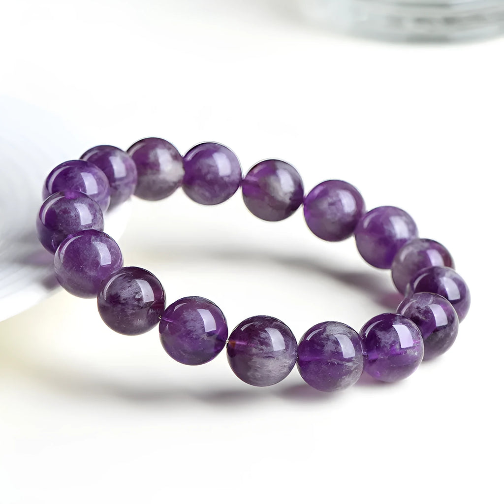 Natural feather amethyst crystal bracelet with scattered beads in Snow Mountain purple colour