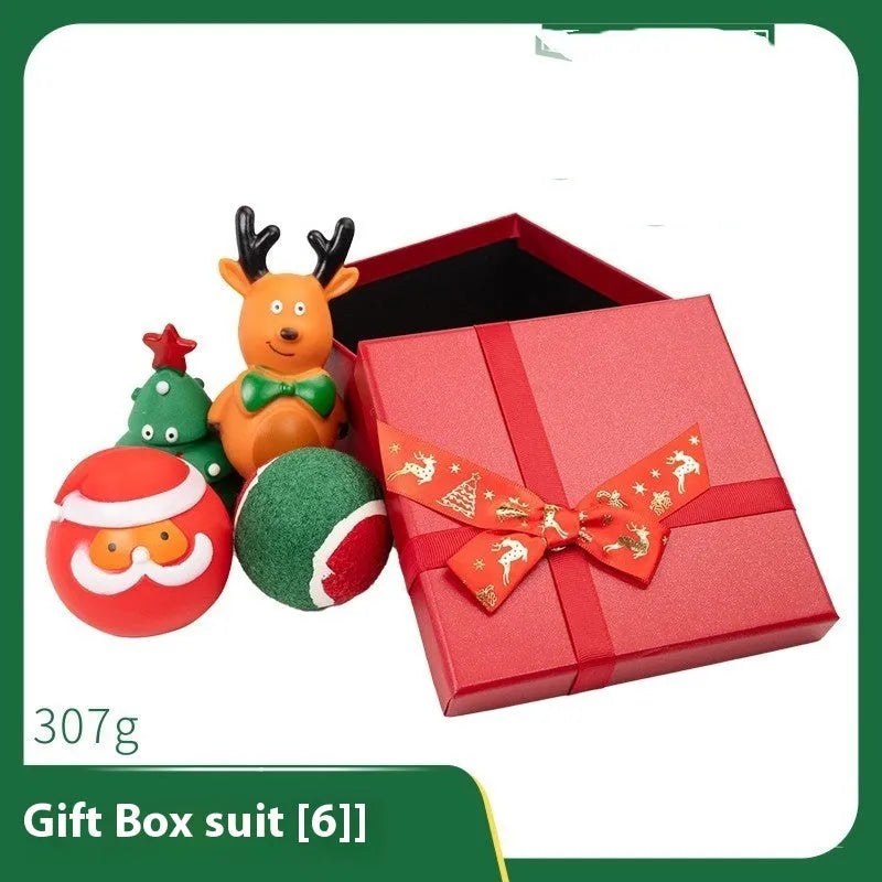 Christmas vinyl dog toy set with Santa Claus heads, trees, tennis balls, and bite ropes