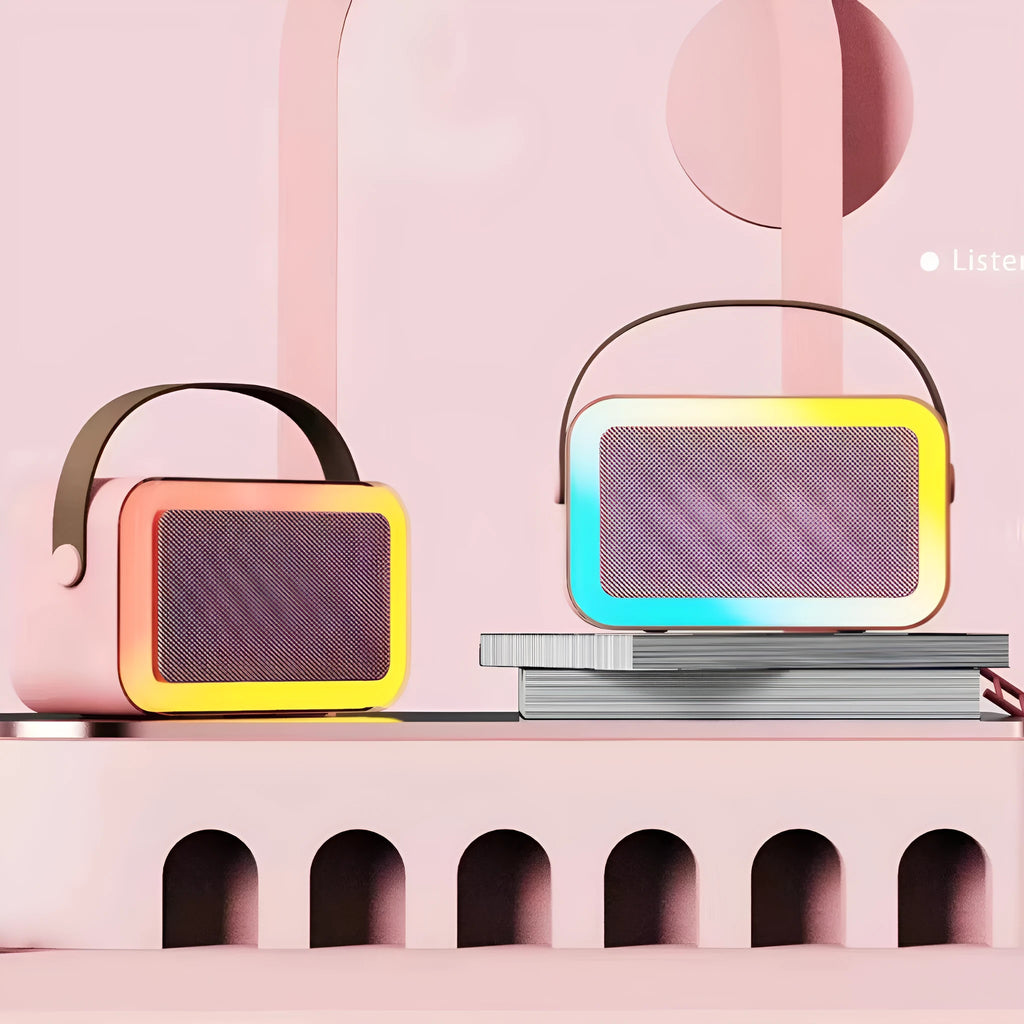 White, pink, or sky blue portable Bluetooth speaker with built-in karaoke microphone and coloured LED lights.
