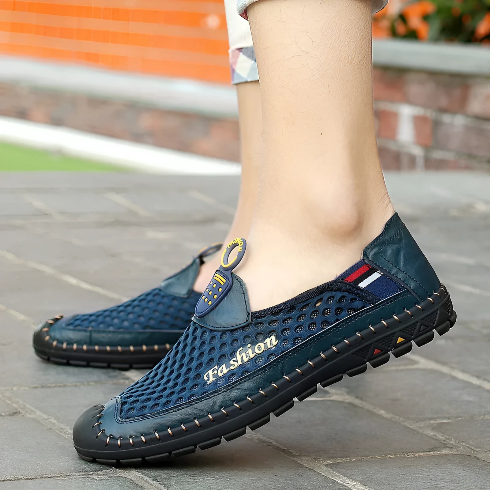 Men's brown breathable mesh casual shoes with round toe and rubber sole on a white background.