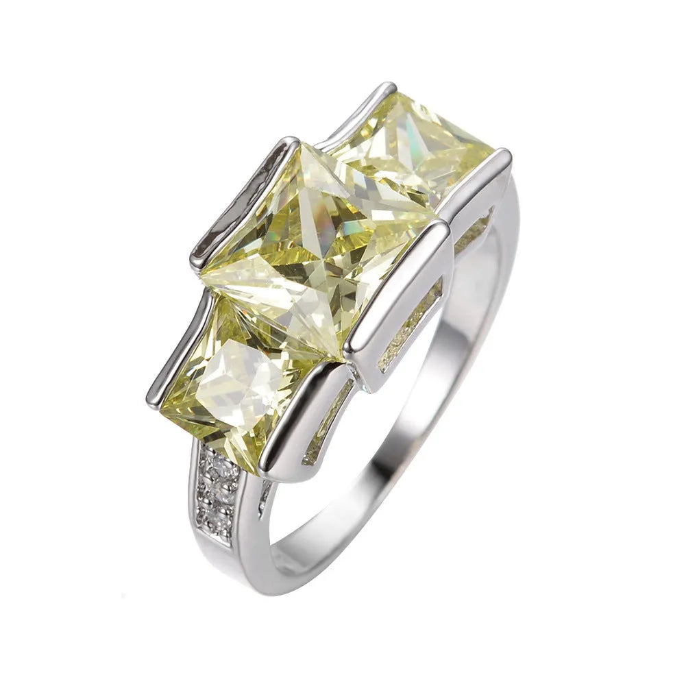 Copper women's ring with electroplated colour finish in geometric design showing multiple colour options