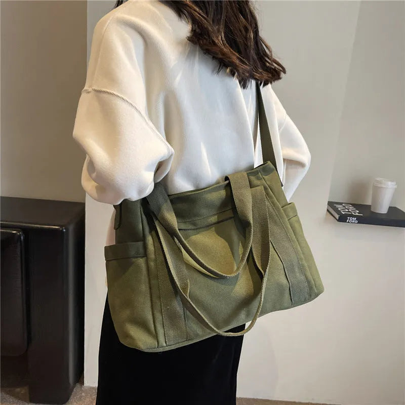 Large capacity shoulder canvas tote bag in solid colour with sandwich pocket and mobile phone compartment