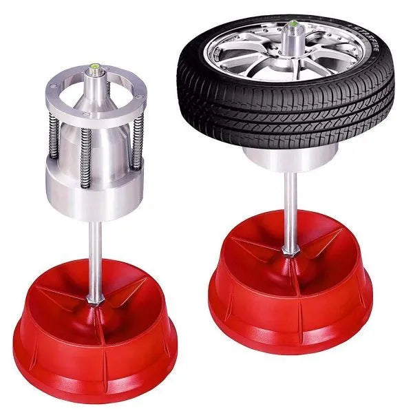 Portable aluminium head hub balancer for car and truck tyres with bull's eye level on a black enamel base.