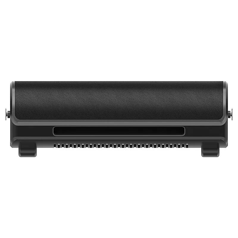Black bladeless car fan with USB cable on vehicle dashboard showing compact 57mm height design