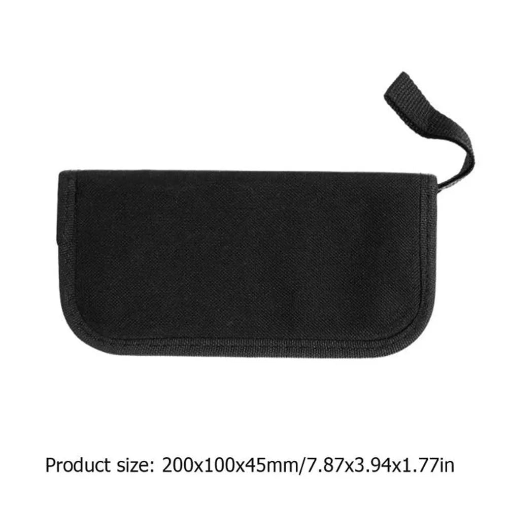 Black guitar repair tool kit open to show plastic and metal maintenance tools for guitar, bass, mandolin, banjo.