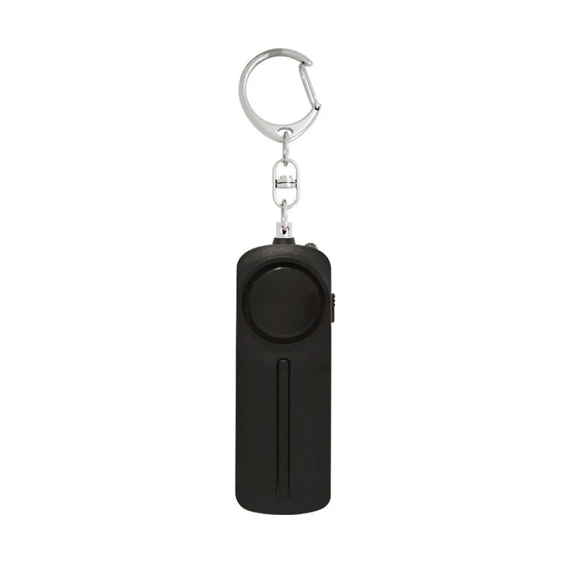 Girls personal safety alarm in multiple colours showing compact 86mm design with activation button