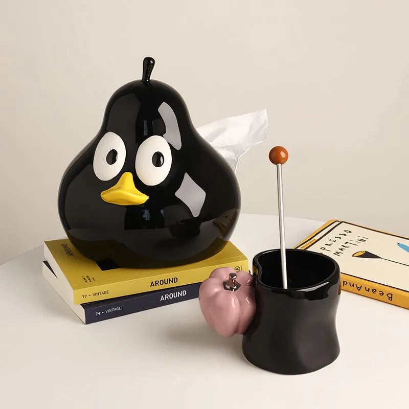 White porcelain pear-shaped tissue box holder in green colour on wooden surface