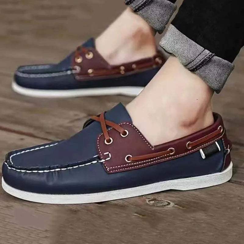 Men's black casual Oxford-style shoes with artificial PU leather upper and flat heel on a white background.