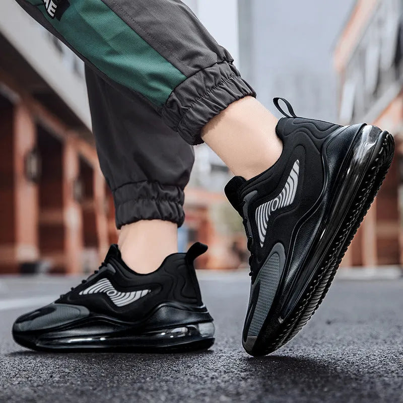 Men's casual mesh sports running shoes in black, side view, flat heel and round toe design