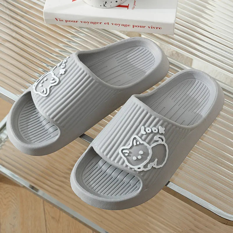 Women's green cat slippers with thick EVA platform sole, shown from above.