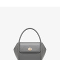 Women's wing-shaped leather tote bag with latch closure and cross-body strap in four colour options