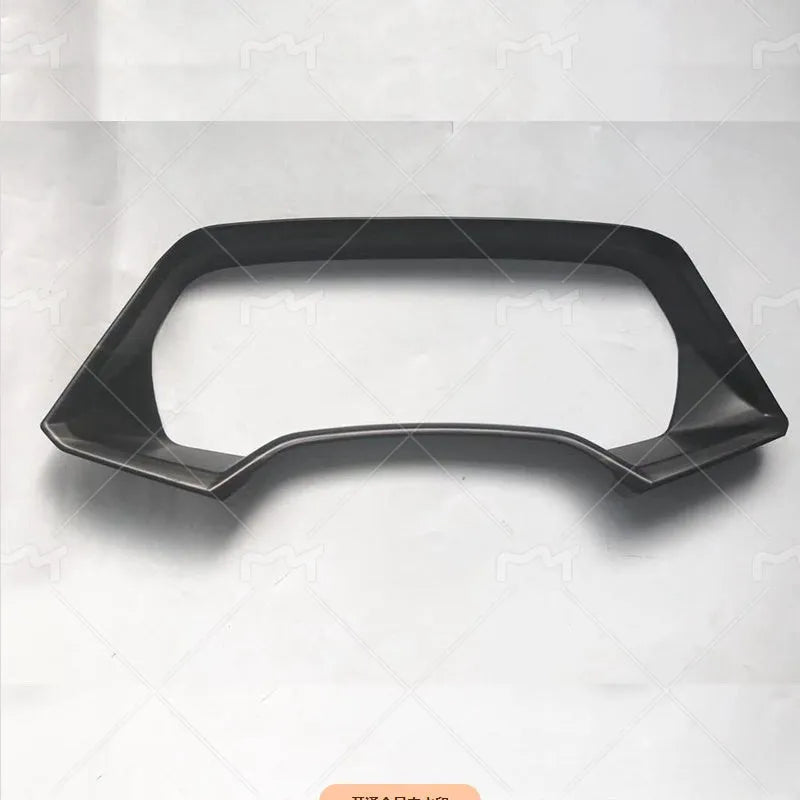BMW X5 dashboard decorative frame in Peach Wood and Carbon Fibre finishes
