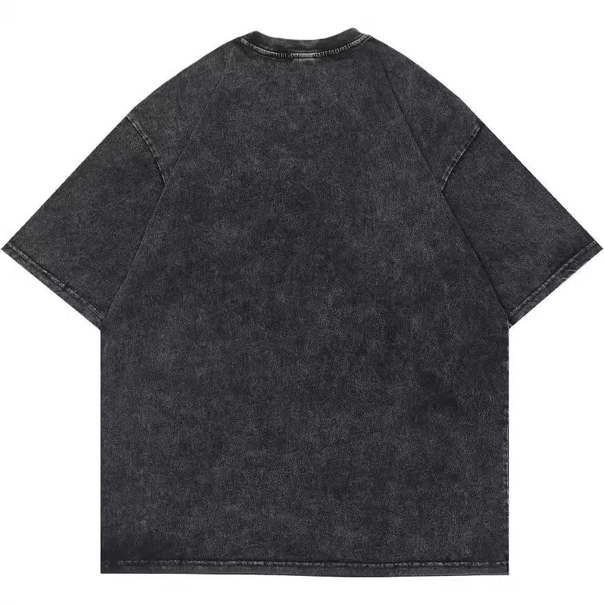 Men's washed black cotton t-shirt with a cartoon print, featuring short sleeves and a loose fit.