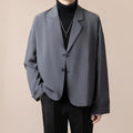 Men's loose fit casual suit jacket in polyester blend fabric showing apricot colour option