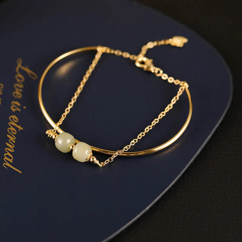 Women's Hetian jade lucky beads bracelet with gold inlay, shown in single, double, and three beads versions.