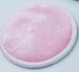 Set of red and blue velvet makeup remover pads next to a cotton mesh storage bag