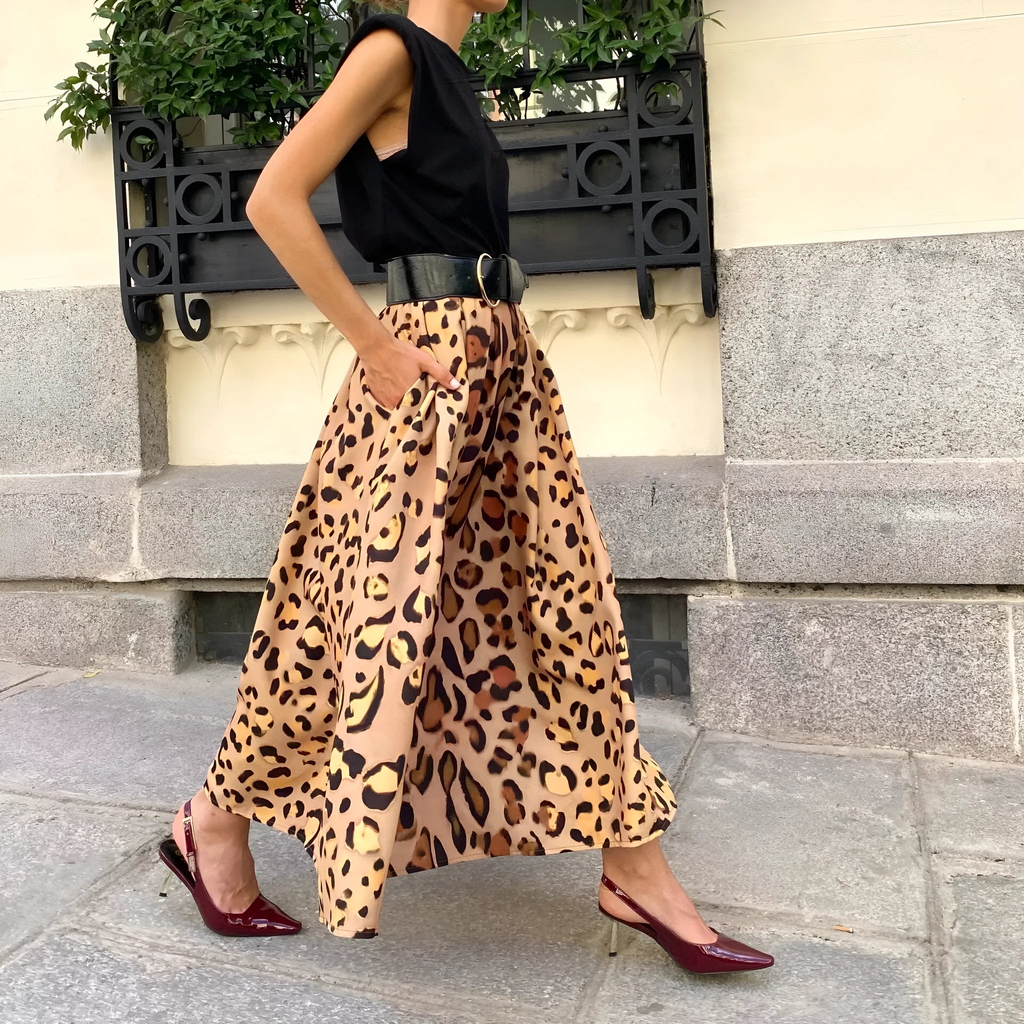 Brown leopard print women's A-line long skirt with elastic waist and big hem detailing