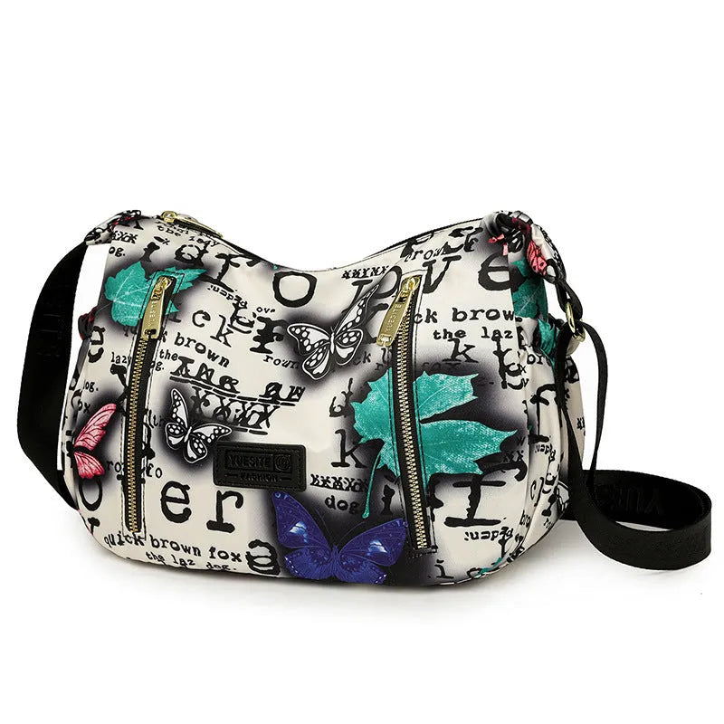 Graffiti casual crossbody bag in nylon with sewing line and print details, medium-soft build, single strap, dumpling shape