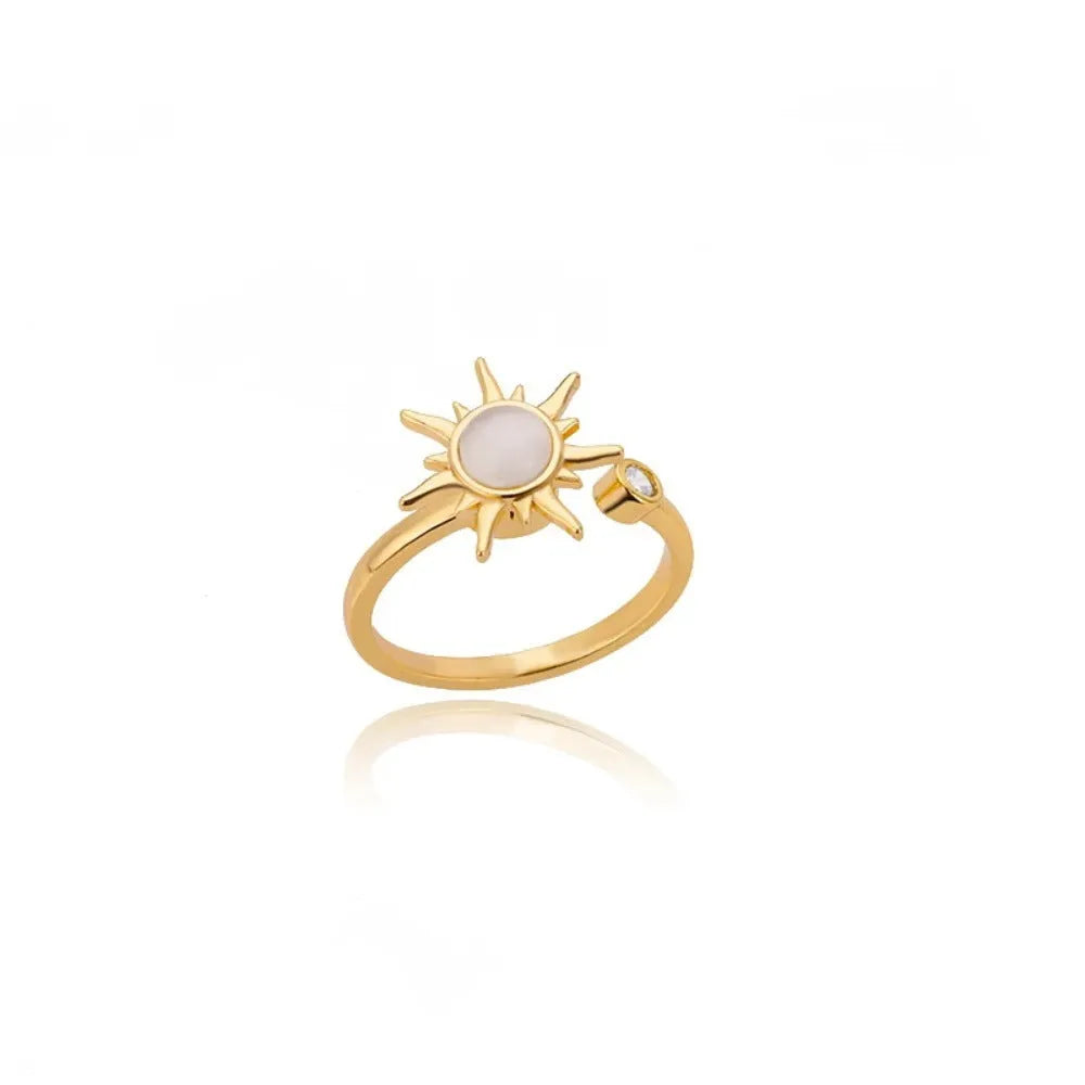 Adjustable copper decompression ring with rotating mechanism in gold electroplated finish