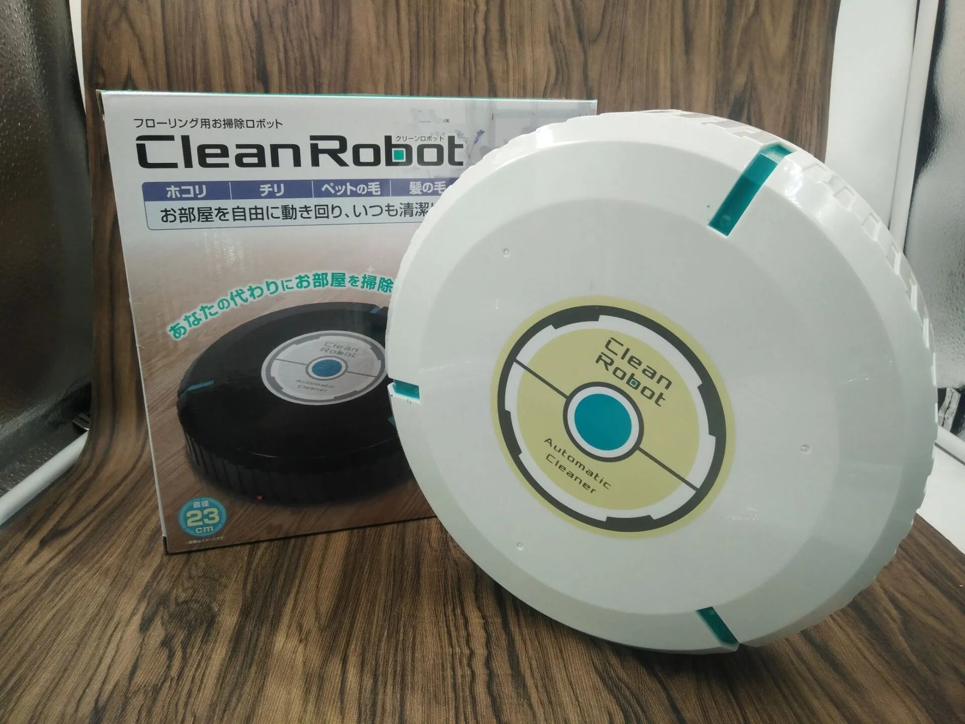AC robot vacuum cleaner automatic sweeping machine in black or white with 23cm diameter