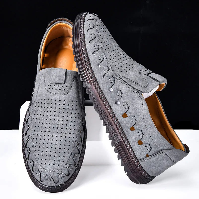 Men's brown casual slip-on shoes with round toe and flat PU leather upper.