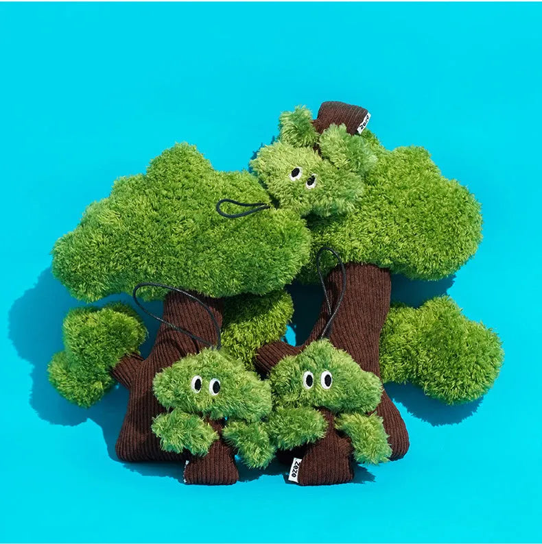 Pine tree shaped cat toy with bag pendant, showing small, medium, and large size options