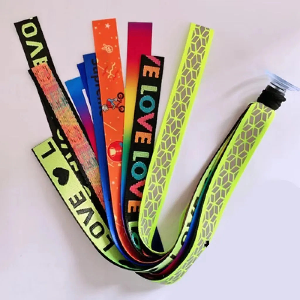 Colourful decorative ribbon streamers attached to a children safety helmet for skating or skiing