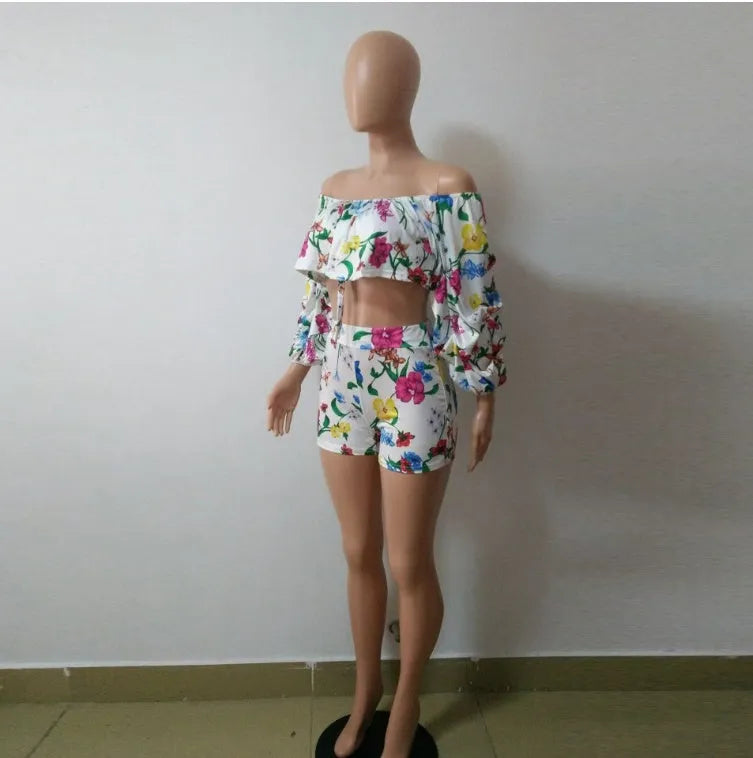 Women's digital print two-piece outfit with pile sleeves on short-sleeve top and matching shorts in multi-colour pattern